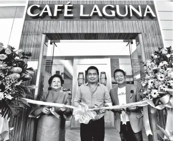  ?? MARK PERANDOS ?? NOW OPEN. Cebu-based restaurant Café Laguna opens its newest branch on Friday, May 18. In photo are (from left) Laguna Group founder and Chief Executive Officer Julita P. Urbina, Davao City Vice Mayor Bernard Al-Ag, and Architect Albert Garbanzos.