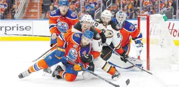  ?? CODIE McLACHLAN/GETTY IMAGES ?? Kris Russell, bottom, seen during Game 6 of the Edmonton Oilers’ series against the Anaheim Ducks last week, signed to a one-year deal with the club in October. The 30-year-old Albertan says he’d like to be back after this year’s breakthrou­gh season.