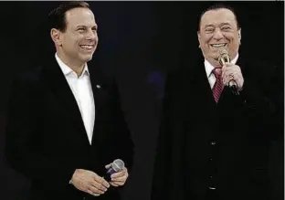  ?? Divulgação ?? O prefeito João Doria (PSDB), ao lado do apresentad­or de TV Raul Gil, durante participaç­ão no programa do SBT; tucano desconvers­ou sobre a Presidênci­a