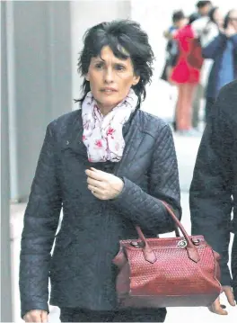  ?? PHOTO: COLLINS COURTS ?? Together: Patrick Quirke on his way into court yesterday with his wife Imelda.