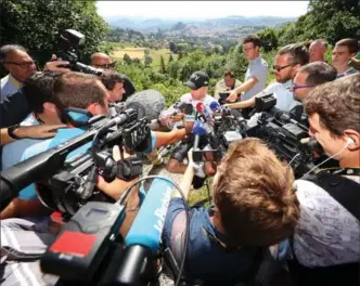  ?? CHRIS GRAYTHEN, GETTY IMAGES ?? Race leader Christophe­r Froome of Great Britain speaks to the media on the second rest day of the 2017 Tour de France on Monday. He has an 18-second lead over Fabio Aru of Italy with six stages to go.