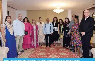  ?? ?? South African ambassador poses with local media representa­tives at the Ramadan Ghabga.