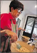  ?? HENRY TAYLOR / HENRY. TAYLOR@AJC.COM ?? Mary Kay Andrews prepares her Beyond the Grave Chicken Salad at her home in Avondale Estates.