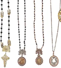  ?? ?? A selection of gold Señorita necklaces with jet beads (azabache), pendant crosses and relicarios, 1800s-1900s