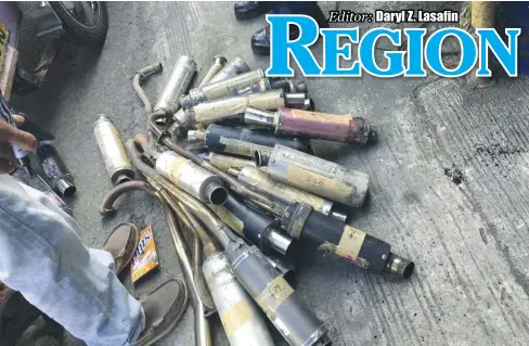  ?? KALIBO POLICE STATION ?? Police in Kalibo, Aklan show some of the modified mufflers they seized from January to March this year.