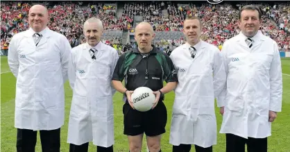  ??  ?? BIG OCCASION: At the 2009 GAA Football All-Ireland Senior Championsh­ip final between Kerry and Cork in Croke Park was match referee Marty Duffy and his umpires, John Kilgannon, Pat Cawley, Michael Duffy (Marty’s brother) and Michael Kelly.