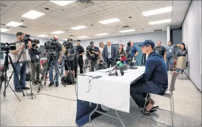  ?? CP PHOTO ?? Pittsburgh Penguins’ Sidney Crosby speaks to reporters during a press conference in Halifax on Wednesday.