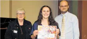  ?? Photos / Jeanette Bell ?? Indi Single, winner of the Best Solo Vocal and Overall Performanc­e, with Stratford Lions Club president Colleen Moore and Stratford High School music teacher Nicholas Orr.