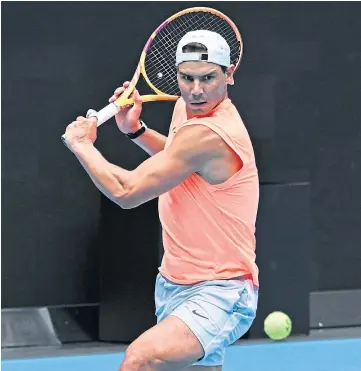  ??  ?? INJURY CONCERN: Rafael Nadal trained yesterday despite suffering back pain.