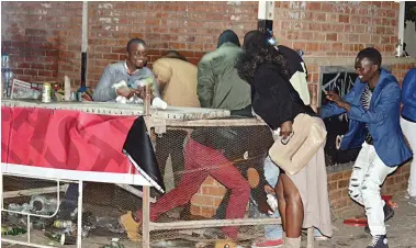  ??  ?? Revellers turn to looting as chaos mars Busy Signal’s performanc­e due to crowd trouble in Bulawayo last week