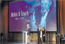  ?? Tomdonoghu­e ?? Robin Leach’s son Gregg and Leach’s grandkids, Jack, Gianna and Meg, are shown at Leach’s celebratio­n of life Sept. 27 at the Palazzo Theater. A stretch of Clark Avenue that runs by the Cleveland Clinic Lou Ruvo Center for Brain Health will be renamed Robin Leach Way.