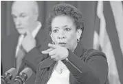  ?? Cliff Owen / Associated Press ?? Attorney General Loretta Lynch called Wednesday’s actions against the banks “historic resolution­s.”