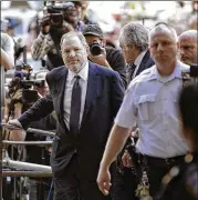  ?? SETH WENIG / ASSOCIATED PRESS ?? Harvey Weinstein, arriving at court in New York on Tuesday, later pleaded not guilty to rape and criminal sex act charges. The hearing in Manhattan comes after a grand jury indicted the former movie mogul last week on charges involving two women.