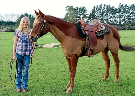  ??  ?? Emma Downs with her horse Radical N Denim (Denny).