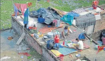  ??  ?? Despite receding water level several low-lying localities remain affected with flood water in Prayagraj.