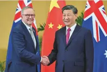  ?? AP ?? Australian Prime Minister Anthony Albanese, left, meets Chinese President Xi Jinping on the sidelines of the G-20 summit in Nusa Dua, Bali, Indonesia, yesterday.