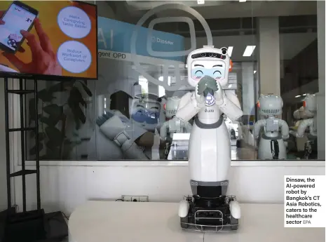  ?? EPA ?? Dinsaw, the AI-powered robot by Bangkok’s CT Asia Robotics, caters to the healthcare sector