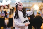  ?? AP PHOTO/MARKUS SCHREIBER ?? A boy dances Tuesday to celebrate the Jewish festival of Purim at a party in a hotel in Berlin, Germany.