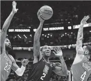  ?? Jonathan Bachman / TNS ?? Kawhi Leonard, center, had 39 points for the Clippers, who outscored the Pelicans 31-20 in the final quarter.