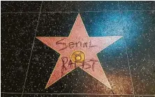  ?? Basak Sezen / Associated Press ?? Bill Cosby's star on the Hollywood Walk of Fame in Los Angeles was vandalized earlier this week. Cosby was convicted in Philadelph­ia this year of aggravated indecent assault.