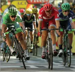  ?? CHRIS GRAYTHEN, GETTY IMAGES ?? Peter Sagan of Slovakia edges Alexander Kristoff of Norway to win stage 16 of the 2016 Le Tour de France, a 209-km stage from Moirans-En-Montagne to Bern Monday.