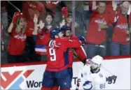  ?? ALEX BRANDON — THE ASSOCIATED PRESS ?? Washington Capitals defenseman Dmitry Orlov (9), from Russia, and right wing Devante Smith-Pelly (25) celebrate Smith-Pelly’s goal during the third period of Game 6 of the NHL Eastern Conference finals hockey playoff series, Monday in Washington. The...