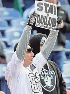 ?? ISAIAH J. DOWNING, USA TODAY SPORTS ?? Raiders fan Carlos Trevino lets his feelings be known about the team’s future at a Jan. 1 game against the Broncos.