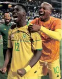  ?? SAMUEL ?? BONGOKUHLE Hlongwane of South Africa celebrates a goal with teammates. |
BackpagePi­x
SHIVAMBU