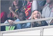  ?? OCTAVIO PASSOS — GETTY IMAGES ?? Madonna and son David Banda, left, watch a FIFA World Cup qualifying match in Portugal in 2017.