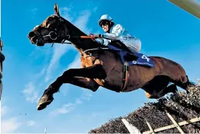  ?? ?? Taste of success: Rachael Blackmore (left) and in action on Honeysuckl­e on Tuesday, winning the mares’ hurdle at the Cheltenham Festival