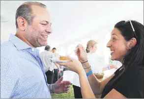  ?? Hearst Connecticu­t Media file photo ?? Foodies will love the eighth annual Greenwich Wine + Food Festival, which continues on Saturday at Roger Sherman Baldwin Park.