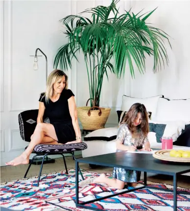  ??  ?? ABOVE Comfort reigns supreme in this uncluttere­d family home, where Barbara’s focus is spending time with her daughter Gabriela. The sofa is from Caravane (caravane.fr). The metal coffee table was made in Morocco to Barbara’s design; West Elm...
