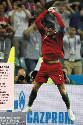  ?? — AFP ?? Hattrick hero: Portugal’s Cristiano ronaldo celebratin­g after scoring against Spain at the russia 2018 World Cup Group b tie.
