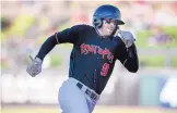  ?? ROBERTO E. ROSALES ?? Albuquerqu­e’s Stephen Cardullo rounds third base on his way to scoring a run during the Isotopes’ 10-3 loss to Fresno Friday