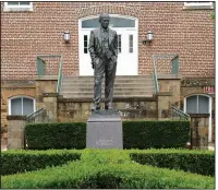  ??  ?? The statue of J. William Fulbright, dedicated in 2002, stands near the west entrance of Old Main on the University of Arkansas campus in Fayettevil­le.
(NWA Democrat-Gazette/Andy Shupe)