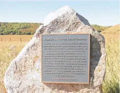  ?? FINDAGRAVE.COM ?? A memorial erected in 2001 to commemorat­e the previously forgotten graves of children who died at the Dunbow Industrial School in Alberta.