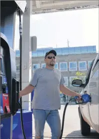 ?? TERRENCE MCEACHERN/THE GUARDIAN ?? Randy Gobble, a constructi­on worker on the Island, said the price increase for regular unleaded gasoline on the Island overnight was “quite a jump.”