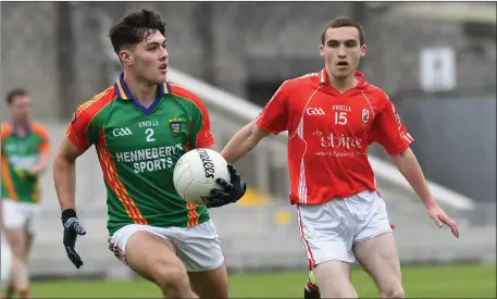  ?? Photo by Domnick Walsh / Eye Focus ?? Dean Fitzgerald, East Kerry and Mike Breen, Mid Kerry in action during the Under 21 Championsh­ip game played in Austin Stack Park last Wednesday evening