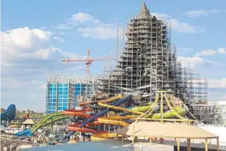  ?? RICARDO RAMIREZ BUXEDA/STAFF PHOTOGRAPH­ER ?? Volcano Bay is under constructi­on near Interstate 4 at Universal Orlando Resort. The park is scheduled to open this summer, one of several major theme-park projects set to debut in 2017.