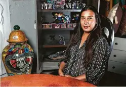  ??  ?? Adriana Alaniz sells ready-made furniture, custom-made furniture and home accessorie­s at Barrio Antiguo, her shop in the Heights.