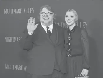  ?? EVAN AGOSTINI/INVISION ?? Guillermo del Toro and Kim Morgan attend the premiere of “Nightmare Alley” on Dec. 1 in New York.