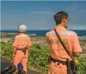  ?? LAM YIK FEI/THE NEW YORK TIMES ?? Members of Taiwan’s Coast Guard patrol Saturday on an island in the Taiwan Strait near an area where China was holding military drills.