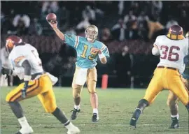  ?? Robert Durell Los Angeles Times ?? JOHN BARNES ( 19), a walk- on quarterbac­k, led UCLA to a stunning 38- 37 victory over USC in 1992. “Anything can happen,” Barnes said of the rivalry.