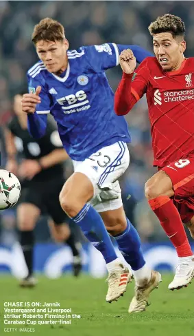  ?? GETTY IMAGES ?? CHASE IS ON: Jannik Vestergaar­d and Liverpool striker Roberto Firmino in the Carabao Cup quarter-final