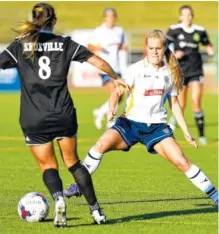  ??  ?? CFC’s Summer Lanter defends against a Knoxville player during Friday’s game at Finley Stadium.