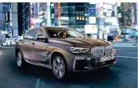  ?? FOTO: GÜNTHER SCHMIED/BMW AG/DPA-TMN ?? Für seinen X6 hat BMW auch einen beleuchtet­en Kühlgergri­ll im Angebot.