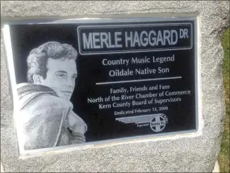  ?? COURTESY OF RAYMOND H. MCDONALD ?? Oildale native son Merle Haggard is memorializ­ed in this engraved landmark on Merle Haggard Drive in Bakersfiel­d.