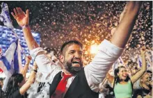  ?? REUTERS ?? People celebrate after Israel’s parliament voted in a new coalition government, ending Benjamin Netanyahu’s 12-year hold on power, at Rabin Square in Tel Aviv, Israel, on Sunday.