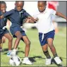  ?? Picture: MARK ANDREWS ?? BATTLE’S ON: Hlumisayo Sili, left, from Voorpos and Lingomso Ndima from St John’s Road compete for the ball