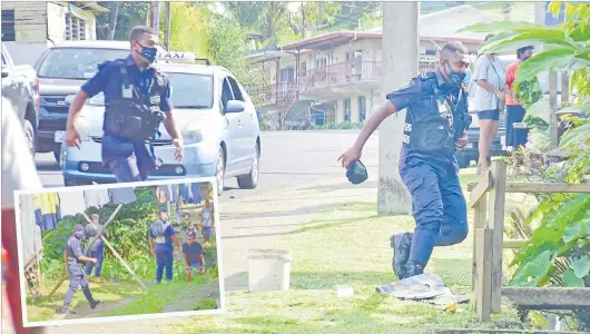  ?? Picture: SOPHIE RALULU ?? Police officers search for youths who were part of a brawl at Jittu Estate, Raiwaqa. Picture: SOPHIE RALULU
Police officers search for suspects believed to be part of a brawl in Jittu Estate in Raiwaqa, Suva yesterday.